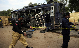 Terrorist attack on Police bus in Karachi assault on peace process: TJP