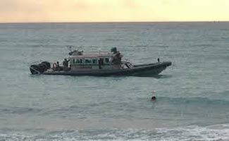 Pakistan Coast Guards recover liquor from smugglers in open sea