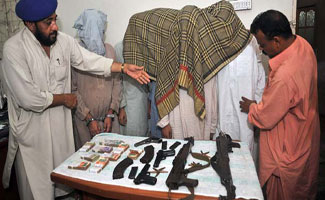 9 hardened criminals netted, weapons seized