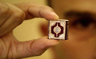 Pilgrim claims to have world's smallest Qur'an