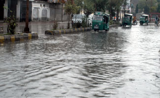 Roads inundated with rain water, filth hamper traffic flow in the city