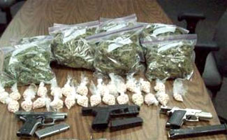 11 held with 2kg drugs, weapons