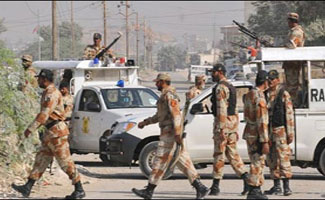 Lyari shootout kills two gang war accused