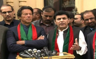 PML-N MNA Ijaz Chaudhry shakes hand with PTI