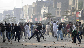 PTI workers block IJ Principal Road