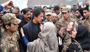 Imran Khan visits Army Public School, homes of martyred children