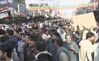 Tension grips Faisalabad as PML-N, PTI workers come face-to-face, raise slogans
