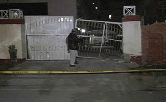 Blast damages college gate in Hayatabad