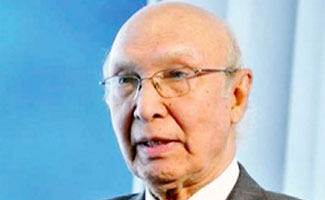 Pakistan don't want to be part of arms race: Sartaj