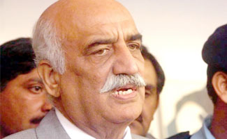 Khursheed Shah condemns attack on community bus