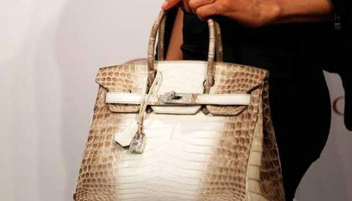 Record $243,000 handbag under the hammer