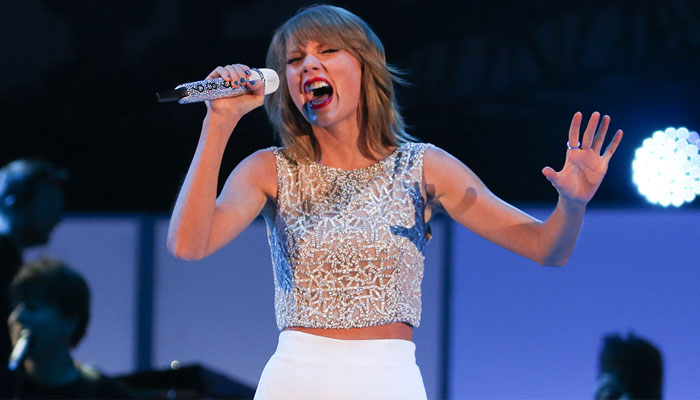 Taylor Swift gives surprise show at fan's wedding
