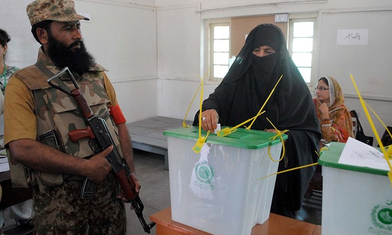 Firing during polling injures two in Karachi