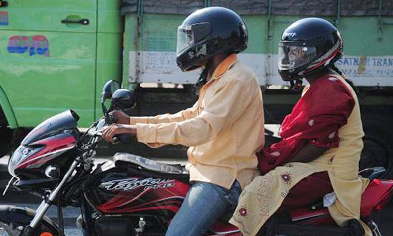 Helmet a must for woman pillion rider