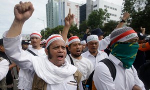 Jakarta's Christian governor stands trial for blasphemy