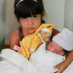 In pictures: Older kids not always happy on arrival of younger siblings!!!