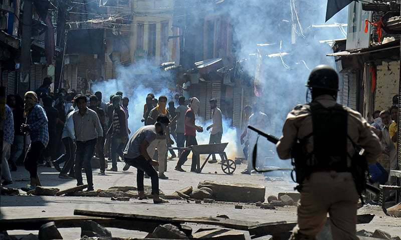 Mourners clash with police at rebel funeral in Indian Kashmir