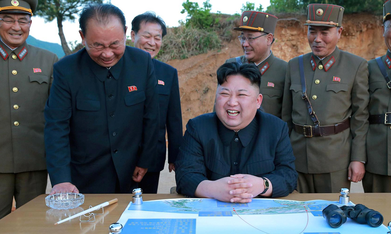 North Korea presses rocket program, but amid signs of drama easing