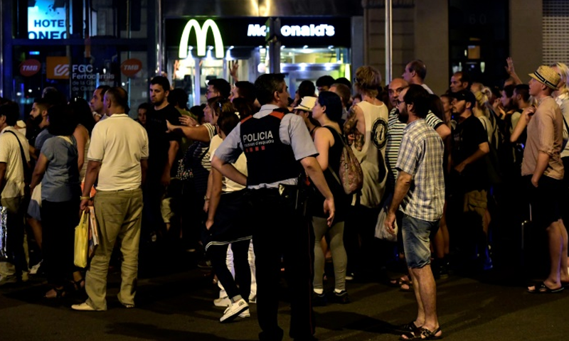 13 dead, 100 injured in two Spanish seaside city attacks