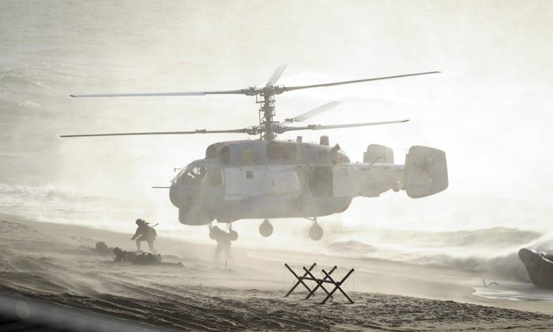 Russia seeks to reassure over war games, denies invasion plans