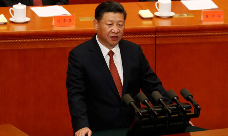 President Xi says China loves peace but won't compromise on sovereignty