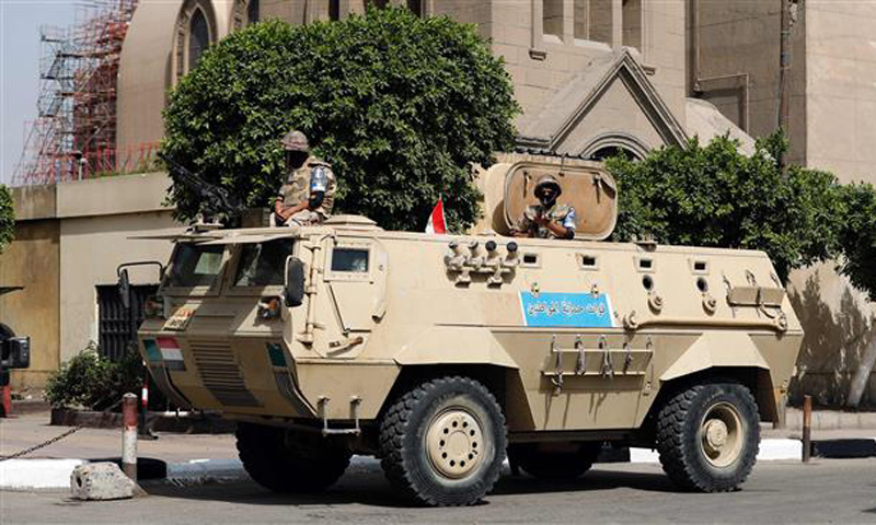 Militant blast, gun attack kill 18 police in Egypt's Sinai