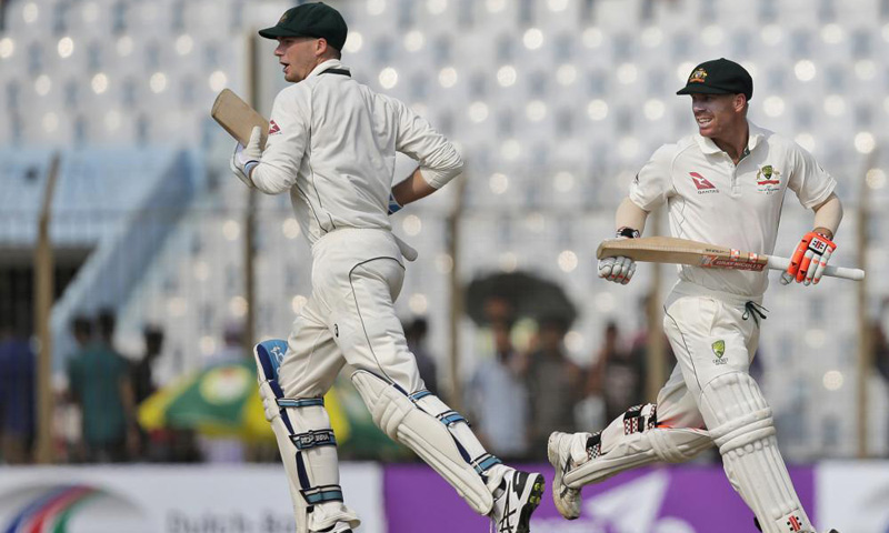 Warner, Handscomb give Australia momentum
