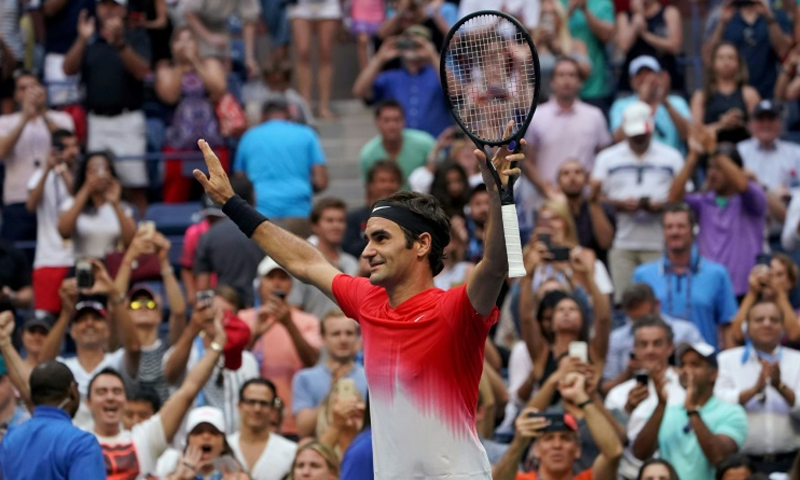 Federer, Nadal battle through at US Open, women's draw takes hit