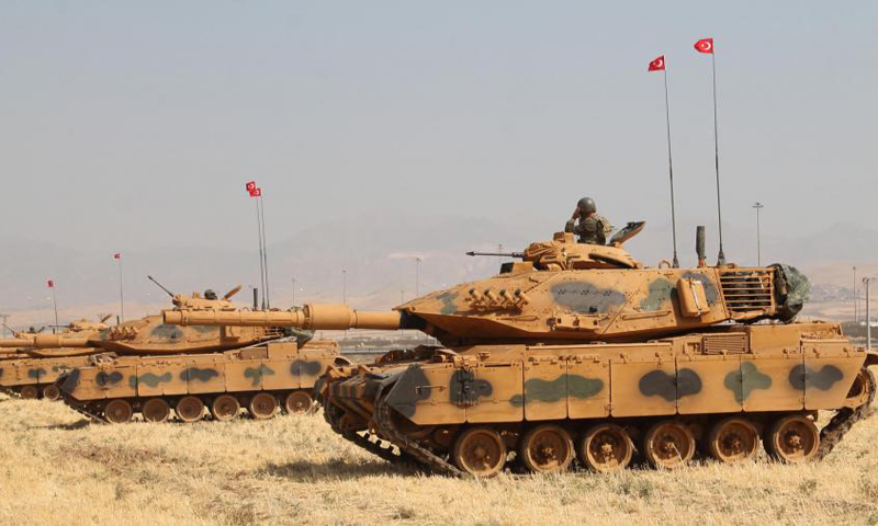 Turkish tanks drill on Iraqi border week before Kurdish vote