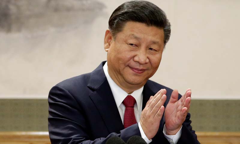 On front page of China's flagship paper, Xi gets Mao-like prominence