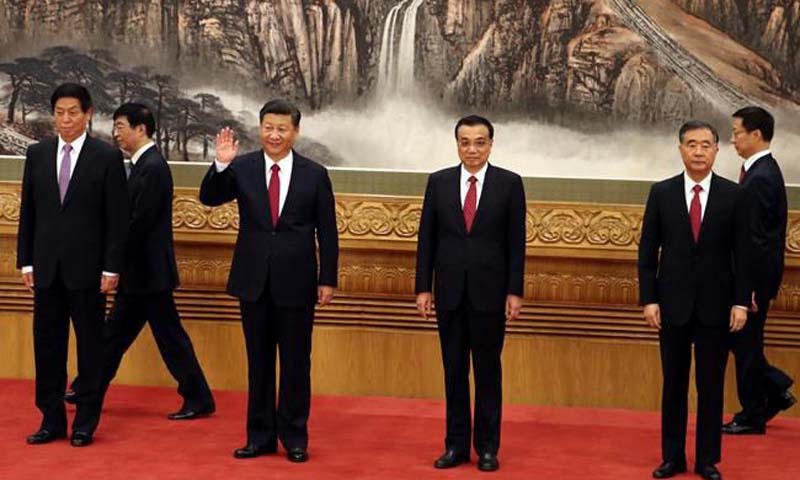 China's Xi unveils new leaders but no obvious successor