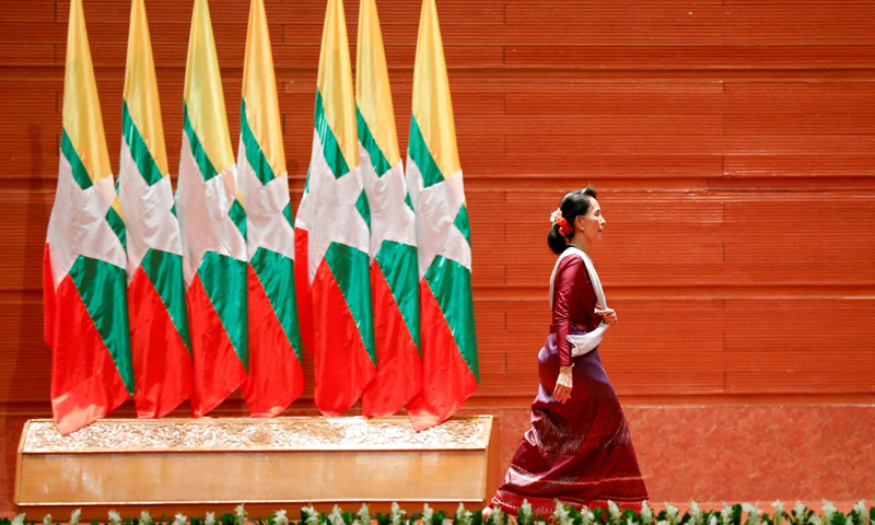 Myanmar leader Suu Kyi departs for genocide hearings amid fanfare at home
