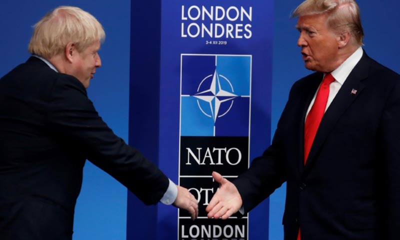 UK PM avoids Trump row in pre-election visit
