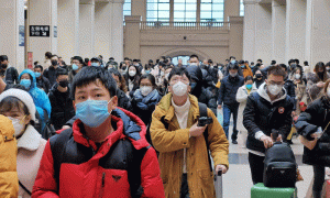 Experts say China virus outbreak will last months at least