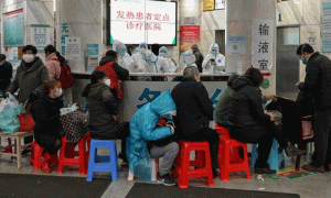 China deploys army medics to overwhelmed virus epicentre