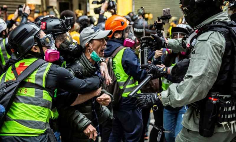 Police, protesters clash during huge Hong Kong pro-democracy rally
