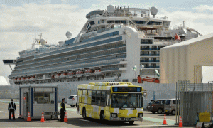 Passengers leave Japan virus ship as China toll tops 2,000