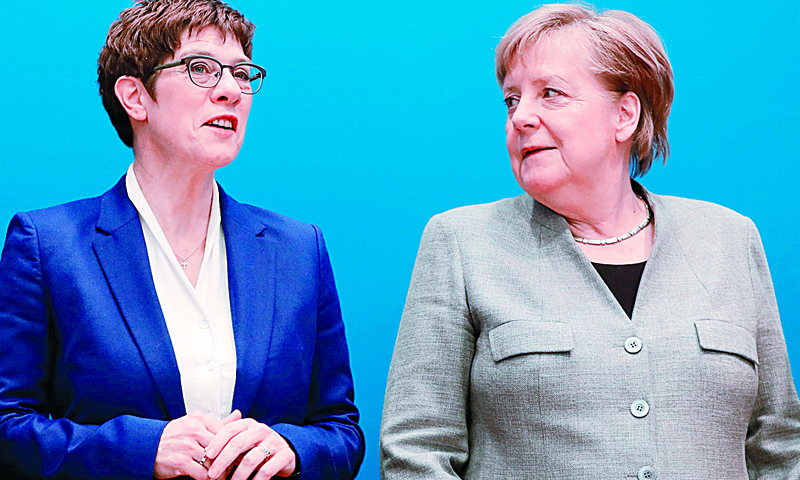 Merkel party in crisis after 'heir' quits over far right row