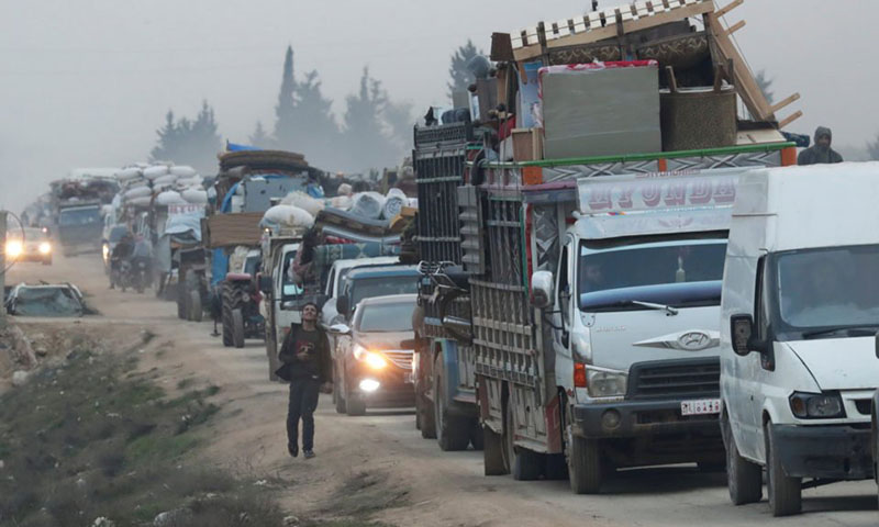 Battle rages over strategic Syrian town of Saraqeb as humanitarian catastrophe unfolds