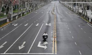 China to ease travel curbs within locked-down Hubei province: official