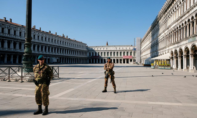 As infections balloon, coronavirus squeezes Europe's armed forces