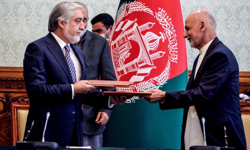 Afghan president and rival strike power-sharing deal after feuding for months