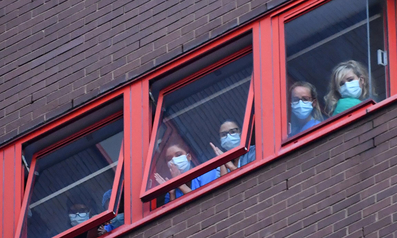 Britain hits coronavirus testing target as death toll leaps again