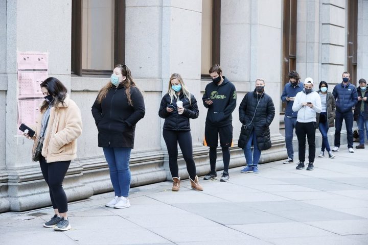 Anxious Americans show up for an election like no other