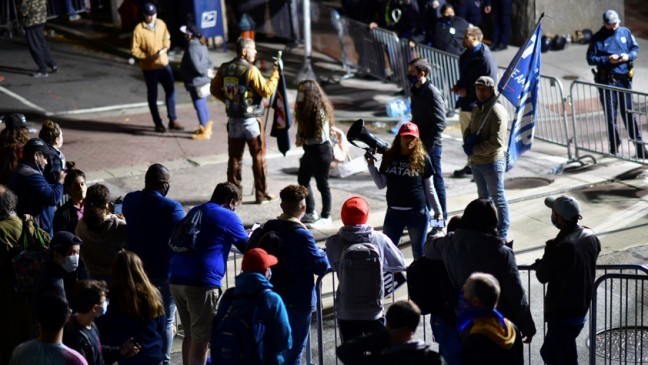 Trump and Biden protesters duel outside vote-counting centers in cliffhanger election
