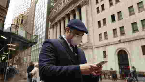 New York shuts early as hospitals fill up in Europe