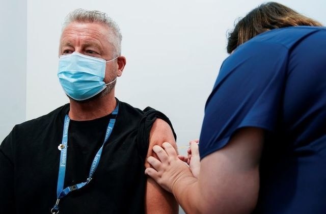 Australia begins mass COVID-19 vaccination programme