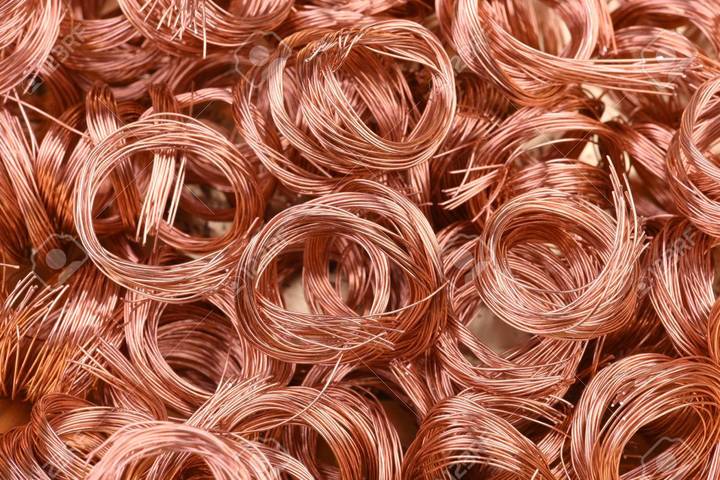 Copper edges down as a firm dollar weighs