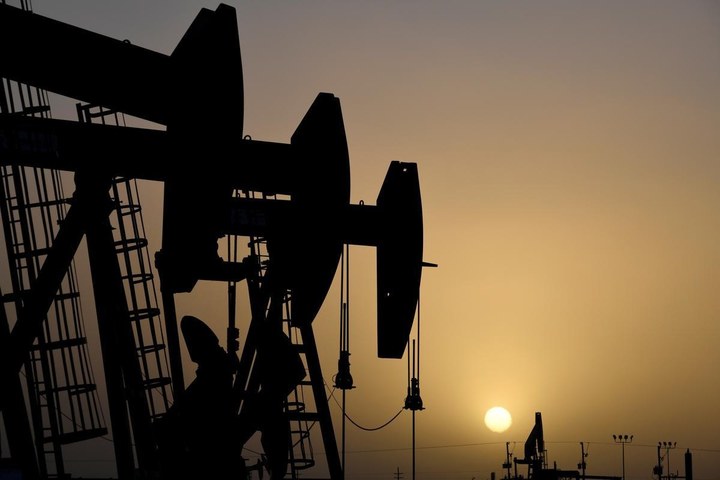 Oil prices rise on economic outlook, drawdown in fuel stocks