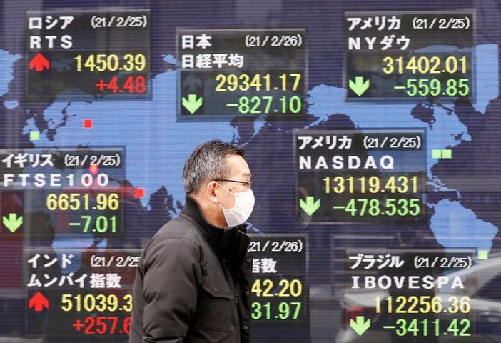 Asian shares slip, dollar rises on flight to safety